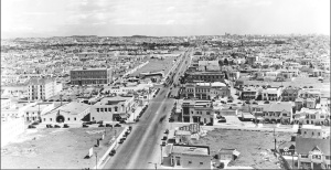 Miracle Mile, cira 1929. Looking east along Wilshire Boulevard from the Desmond's building. The intersection in the foreground is Wilshire and Cochran.